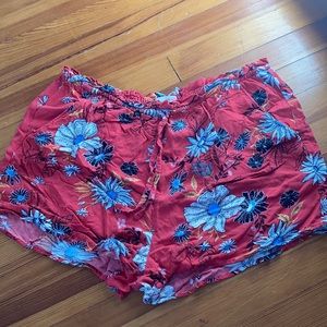 Red shorts with Floral print design